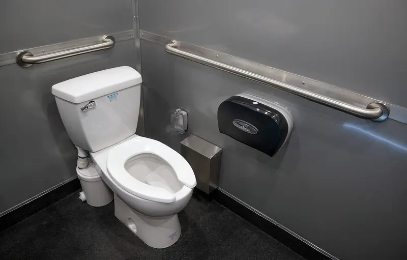 ADA shower interior with grab bars